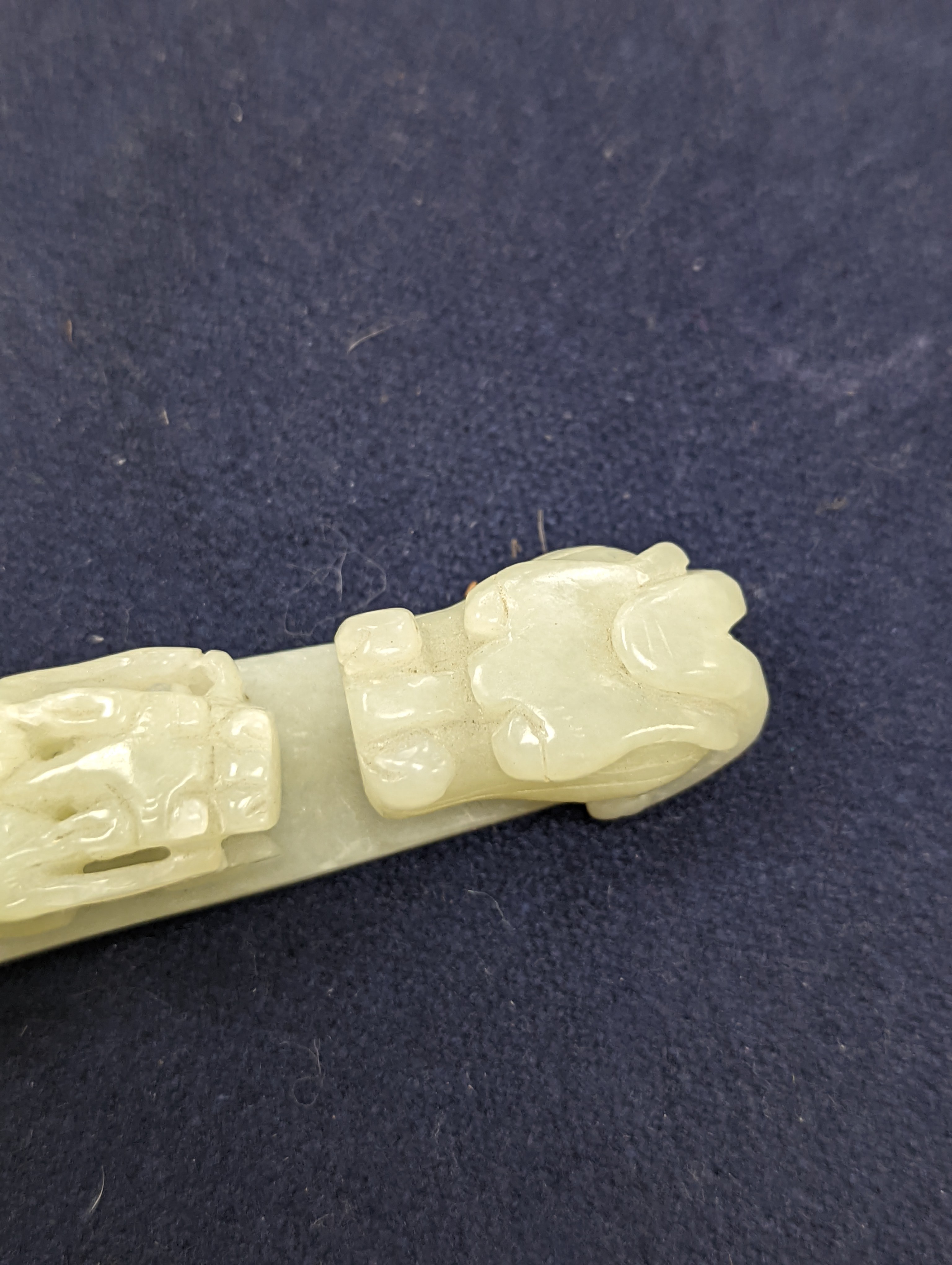 A Chinese jade belt hook, 12.5cm an archer's ring and figure, a stone cup and a glass snuff bottle